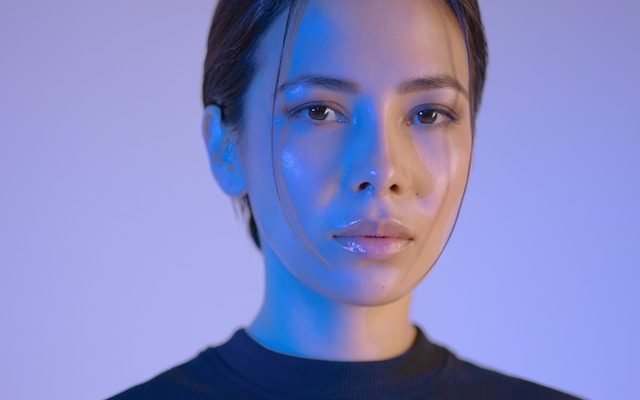 woman wearing black crew-neck shirt